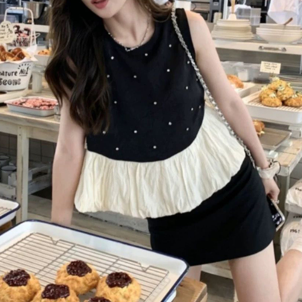 ノースリビジューバルーンペプラムトップス