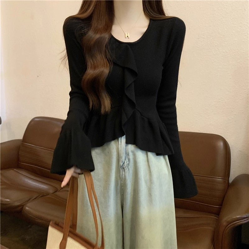 ベルスリーブペプラムニット