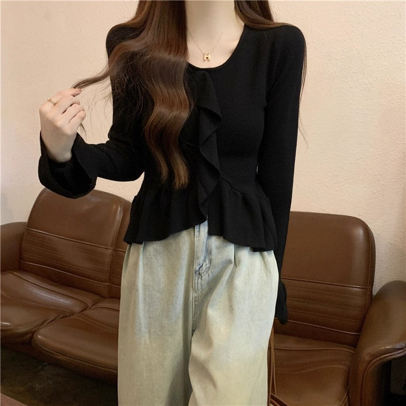 ベルスリーブペプラムニット