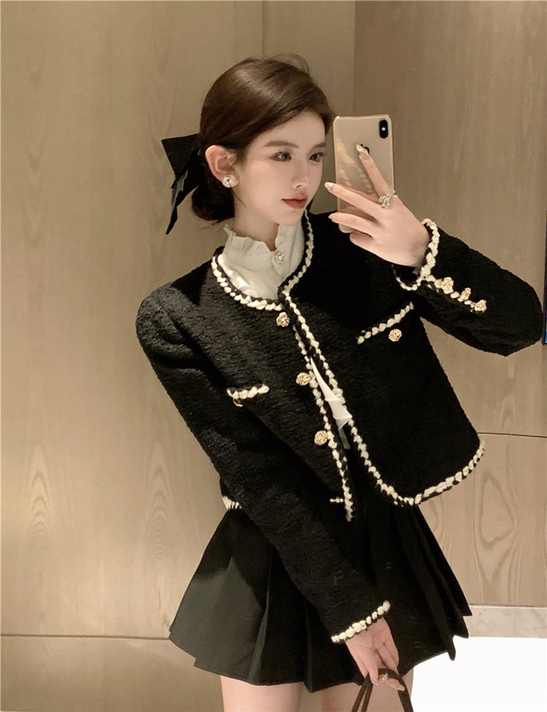 クラシカルなブラックツイードジャケット