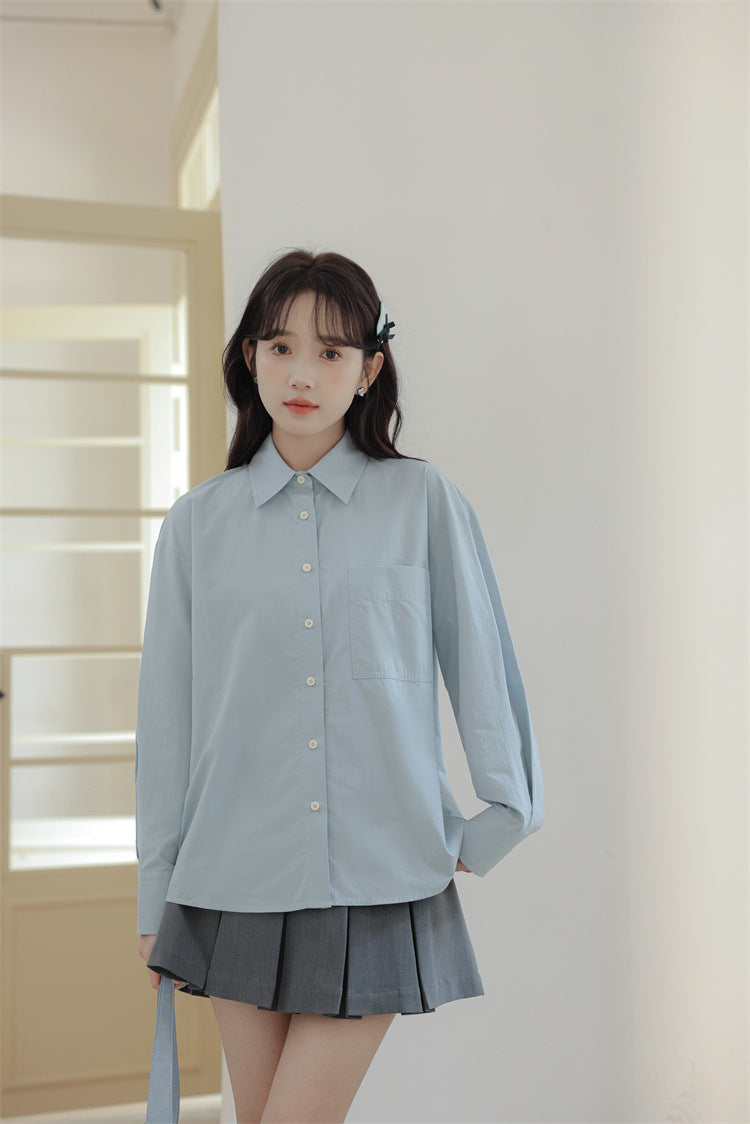 バックリボンライトブルーシャツ