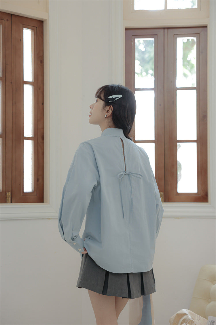 バックリボンライトブルーシャツ