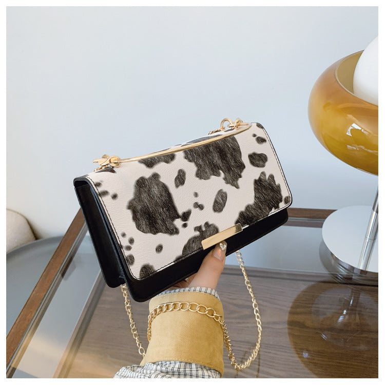 カウパターンチェーンミニバッグ