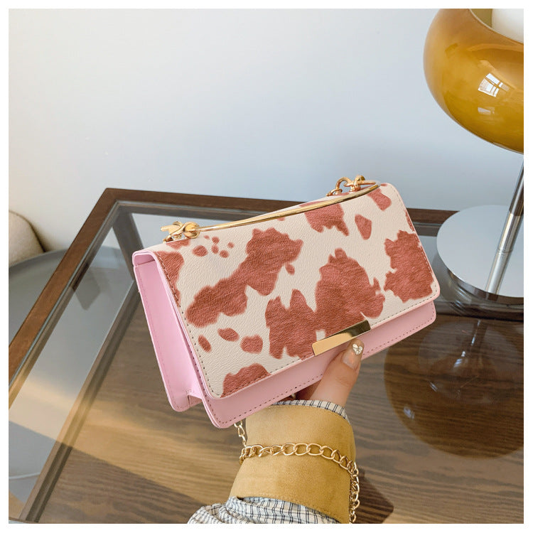 カウパターンチェーンミニバッグ